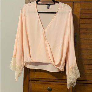 NWT! pink cross over blouse w/ lace sleeve detail